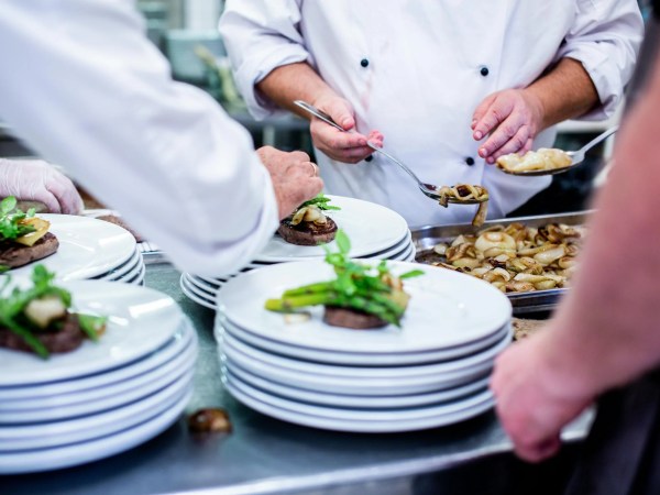 Chefs in the industry most at risk of failure serve food onto stacks of white ceramic plates. Image by Rene Terp.