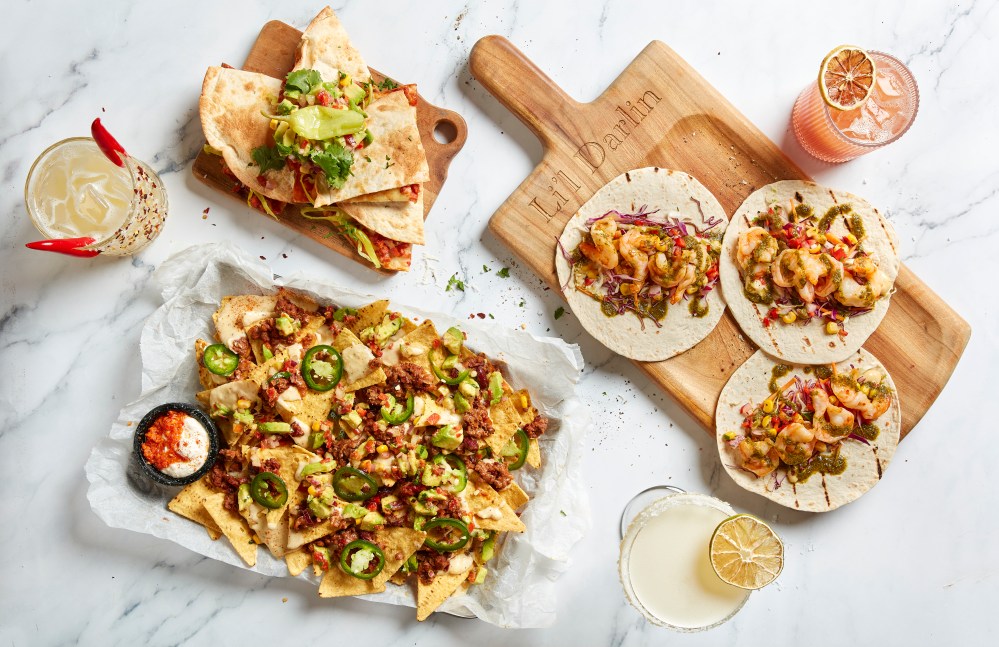 A flat lay of tapas and share plates at Li'l Darlin.