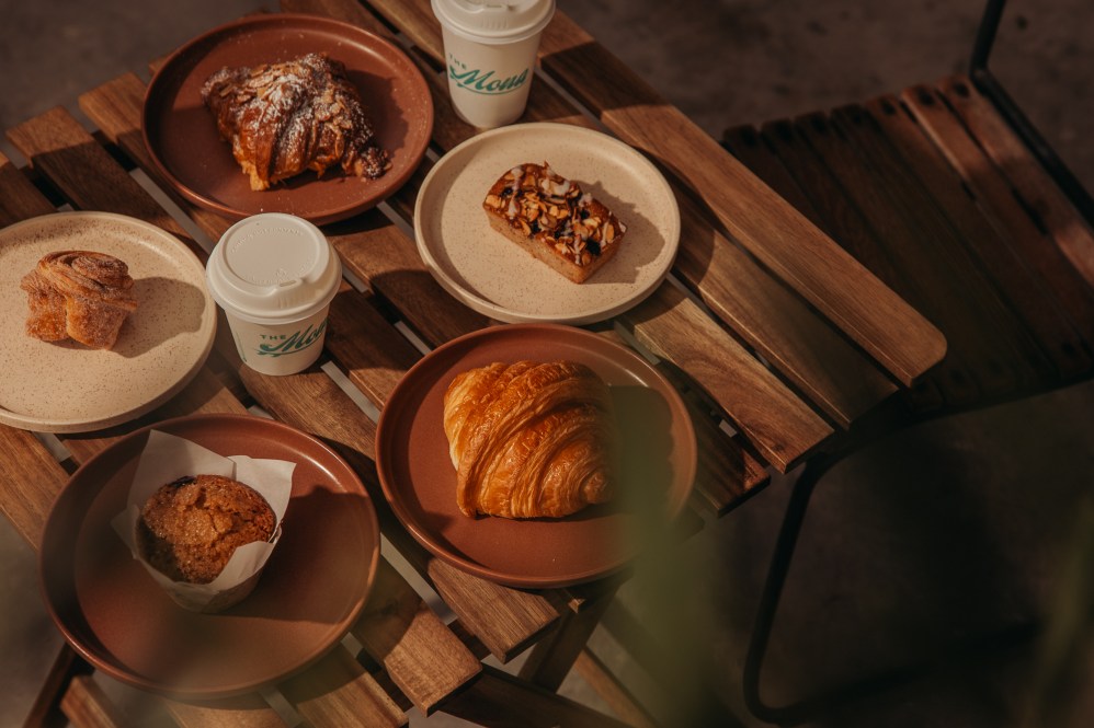 An array of baked goods on a table from Ben's Bakery Cafe at The Mona. 