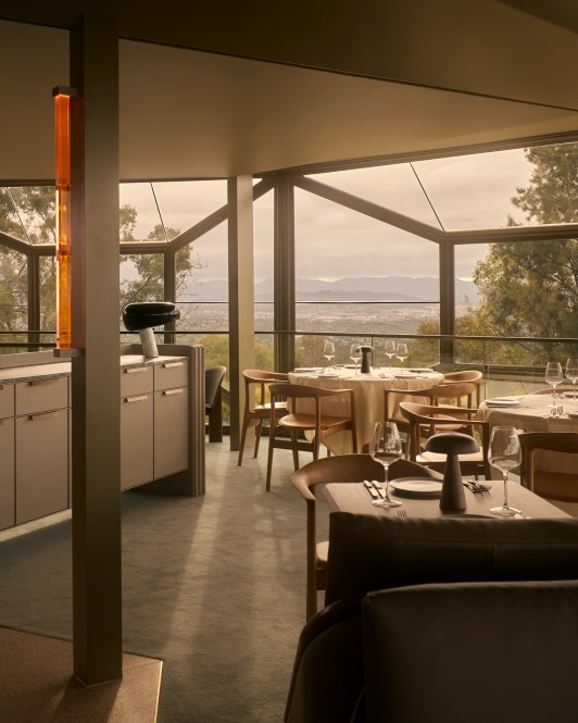 Lunetta restaurant interior with windows looking over Canberra.