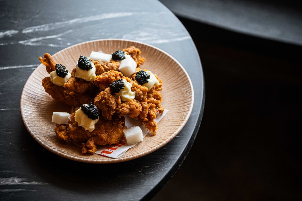 Crispy Korean-style fried chicken with caviar at Ruma.