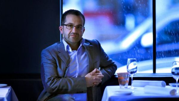 George Calombaris' business partner George Sykotis looking at camera