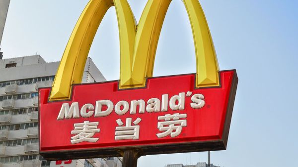 McDonald's Golden arches sign with Chinese script underneath